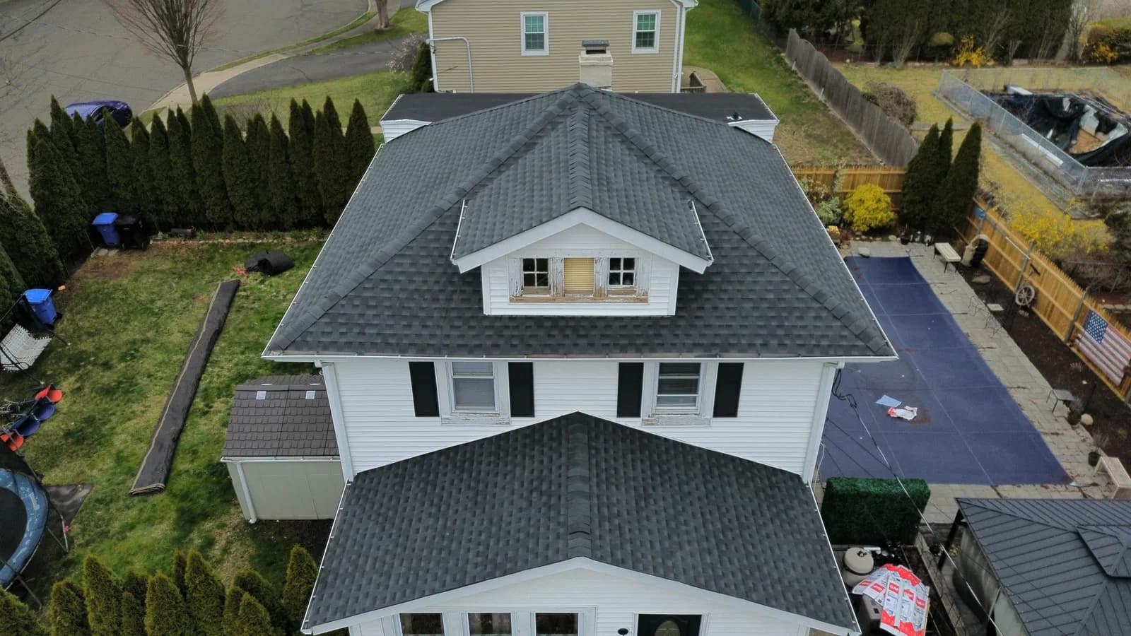 Architectural asphalt shingle roof on a New Jersey home, finished and clean